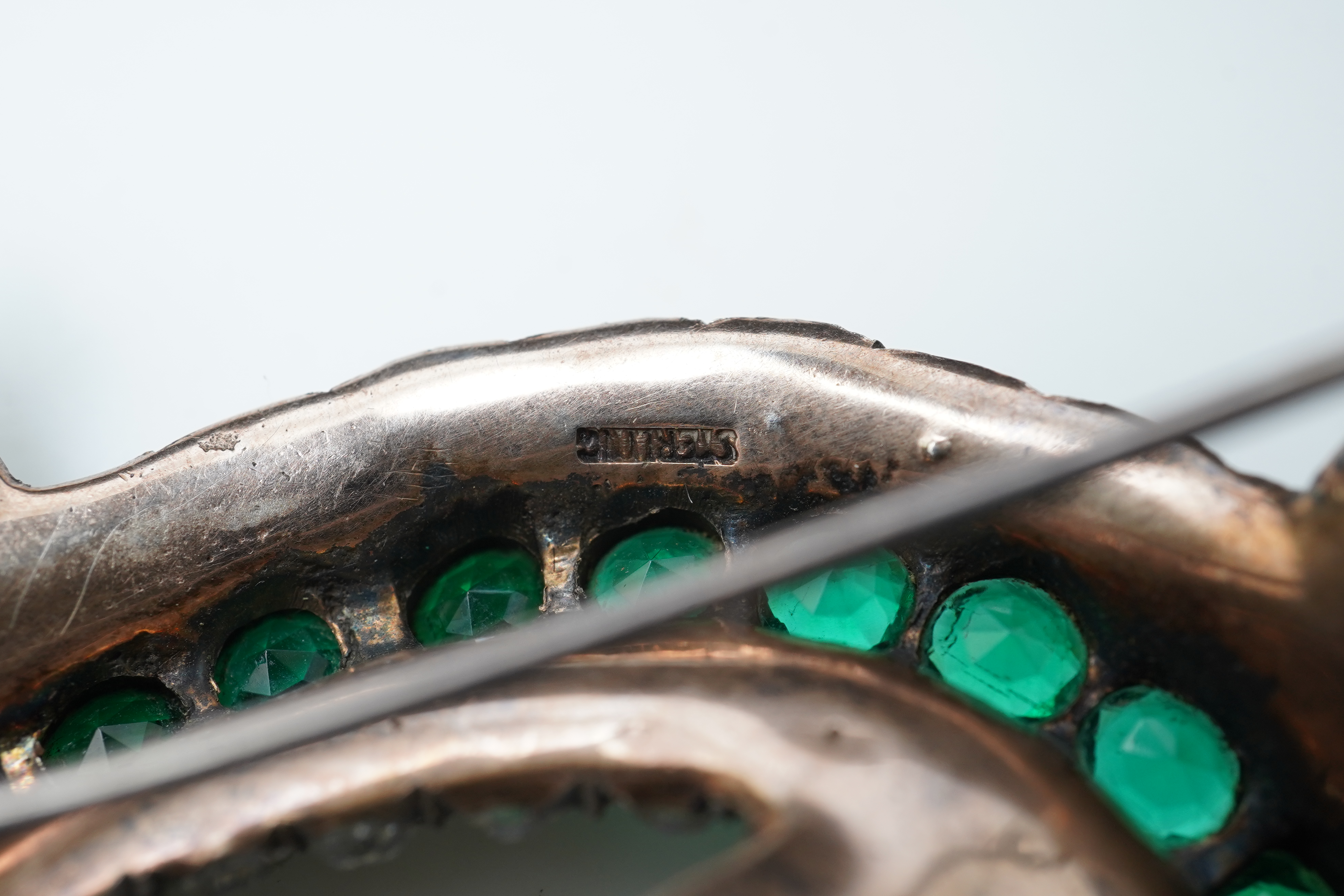 A silver and paste brooch, early 20th century